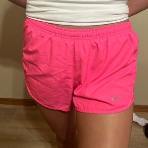 small women’s nike running shorts with small hole